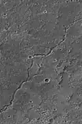 Mars Global Surveyor Mars Orbiter Camera (MOC) image of lava channel on the northeastern summit of Ascraeus Mons.