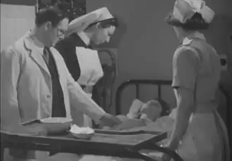 With doctor, sister and patient