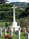 The Cross of Sacrifice is a Grade II listed structure, designed by Sir Reginald Blomfield circa 1922.[8]