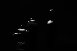 Low-key photograph created by using a single source of light