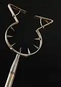 Early modern German man catcher with locking arms and inward facing spikes