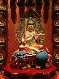 Manjushri, seated on a blue lion at Buddha Tooth Relic Temple and Museum, Singapore