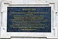 Plaque commemorating the construction and reconstructions of the bridge