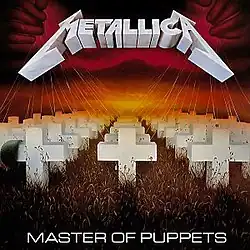Cemetery field of white crosses tethered to strings, manipulated by a pair of hands in a clouded, blood-red sky, with a fiery orange glow on the horizon