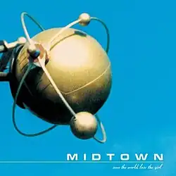 A golden globe with two rings around it with a blue skyline in the background