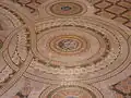 Minton Floor, show Liverpool's coat of arms, surrounded by the symbols of England, Scotland and Ireland, the rose, thistle (only one visible in photo) and shamrock.