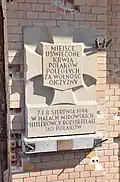 The Tchorek plaque commemorating the massacre of civilian population of 1944.