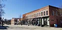 Two-story brick buildings.