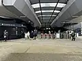 The station's main concourse, showing the Myki barriers and the customer service, October 2024