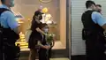 At about 8 pm, a mother and her two young children holding flowers were surrounded and searched by police officers outside Sogo.[41]