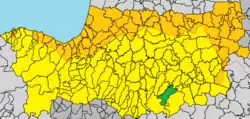Map of the Nicosia District in yellow with a green segment in the bottom right corner indicating the location of Kapades.