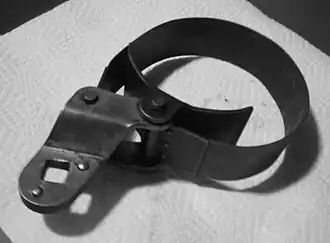 A strap wrench variant (one form of oil filter wrench).