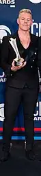Rosen with Old Dominion on stage receiving his award in April 2019, Old Dominion won Vocal Group of the Year at the Academy of Country Music Awards