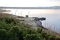 Old Slipway at Innermessan on Loch Ryan, Inch, Wigtownshire with Stranraer in the background
