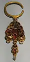 Similar earring to the BM example but with a single sub-pendant (GNM)