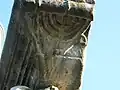 Detail of a menorah relief on a column