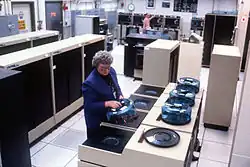 Computer room for PAVE PAWS at Cape Cod AFS, 1986. Note the four large hard disk units in the foreground.