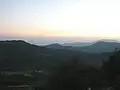 Sunset on the road upon Mount Vesalo