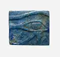 Ancient Egyptian plaque with an Eye of Horus; 664–332 BC; lapis lazuli; length: 1.8 cm (0.71 in), width: 1.6 cm (0.63 in); Metropolitan Museum of Art