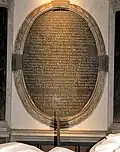 Oval plaque in Monins' memorial