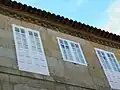 Renaissance decoration shaped like balls on the upper part of one of the façades