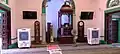 The front of the mosque prayer hall with the mihrab and minbar visible.