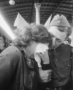 "Tears of happiness". A woman is happy that a soldier has returned alive. Moscow, June 1, 1945.
