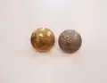 ROC metal tunic buttons (gilt Officer's button 3 mm larger in diameter), depicting the Elizabethan Beacon Lighter in a coastal setting.