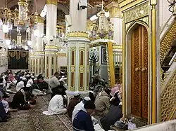 People praying in the Prophet's Mosque (Medina, Saudi Arabia)