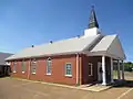 The First Baptist Church of Castor is located adjacent to the public school complex.
