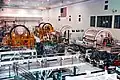 Overview of the high bay factory floor filled with space station modules