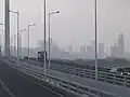 China Resources Headquarters (tallest building under construction on the far right) and other skyscrapers in Houhai as viewed from Shenzhen Bay Bridge