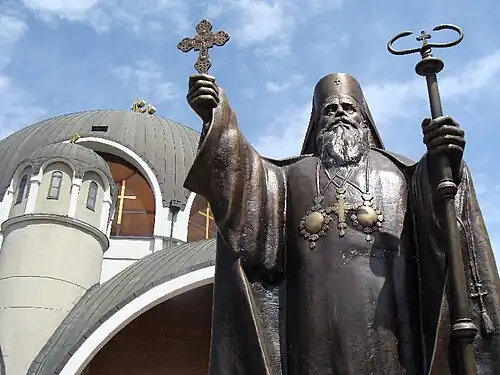 Statue of Dositheus II in front of the church.