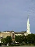 View of the 1888 boys school with the church in the background.