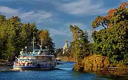 Saint Nicholas Skete on island Valaam on Ladoga lake and little ship.