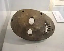 Stone mask unearthed in the Hebron Hills. Moshe Stekelis Museum of Prehistory, Haifa.​​‌
