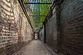 The tomb is surrounded by Pakistan Railways property, and can only be accessed through a walled passageway.