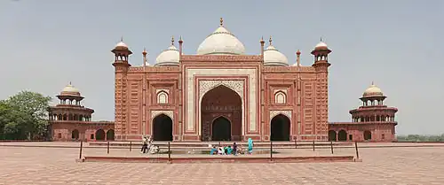 Image 14 Taj Mahal Mosque Photo: Muhammad Mahdi Karim The mosque at the Taj Mahal complex in Agra, India. This red sandstone building, on the western side of the complex, faces the west side of the mausoleum. In the forefront is a howz, meant for ablution. On the eastern side of the complex is the jawab ("answer"), a mirror image of the mosque except for the missing mihrab and different floor pattern; this jawab was mainly intended for architectural balance. Both were constructed in 1643. More selected pictures