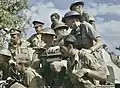 Soldiers in khaki drill receive a briefing at Eighth Army Headquarters in Italy, September 1943.