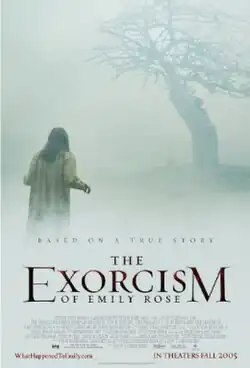 In a foggy landscape, a raggedy woman looks towards a leafless tree on a hill.