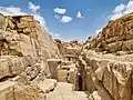 The mastaba and entrance to the tomb (left)