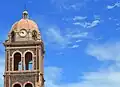 Bell tower added during city's main square modernizations in early 20th century