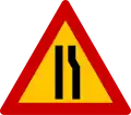 K-6δ Road narrows on right