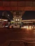 Transjakarta bus passing the ASEAN Bus station which is located at the east of the transit hub