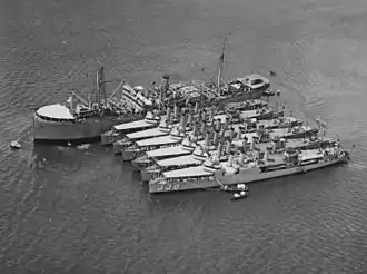 USS Altair (AD-11) at Pearl Harbor with destroyers on 8 February 1925