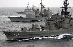 US Navy 070318-N-5961C-262 Japan Maritime Self Defense Force (JMSDF) ship JS Haruna (DDH-141), USS Lake Champlain (CG-57) and USS Russell (DDG-59) steam in formation during a photo exercise