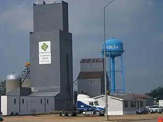 The grain elevator and the water tower within Volga