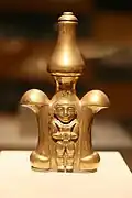 Lime container; 5th-9th century; gold; 23 cm (9 in) high; Metropolitan Museum of Art (New York City). Likely used by a member of the Quimbaya elite
