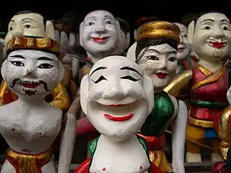 Image 14Water puppetry, lit. "Making puppets dance on water") is a tradition that dates back as far as the 11th century when it originated in the villages of the Red River Delta area of northern Vietnam.