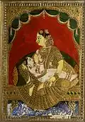 Woman breast-feeding a boy